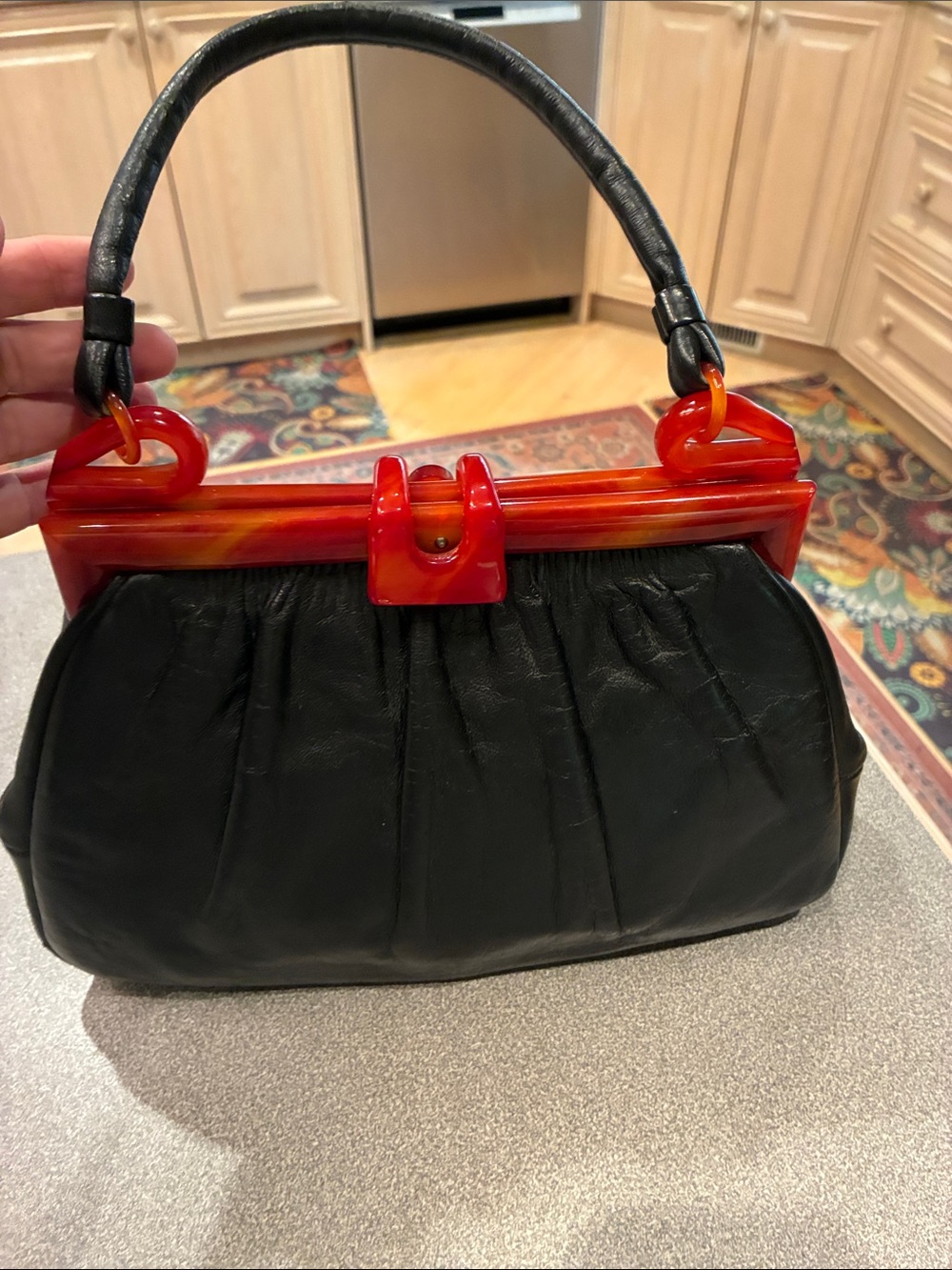 Black Shoulder Bag with Red-Orange Resin Accent